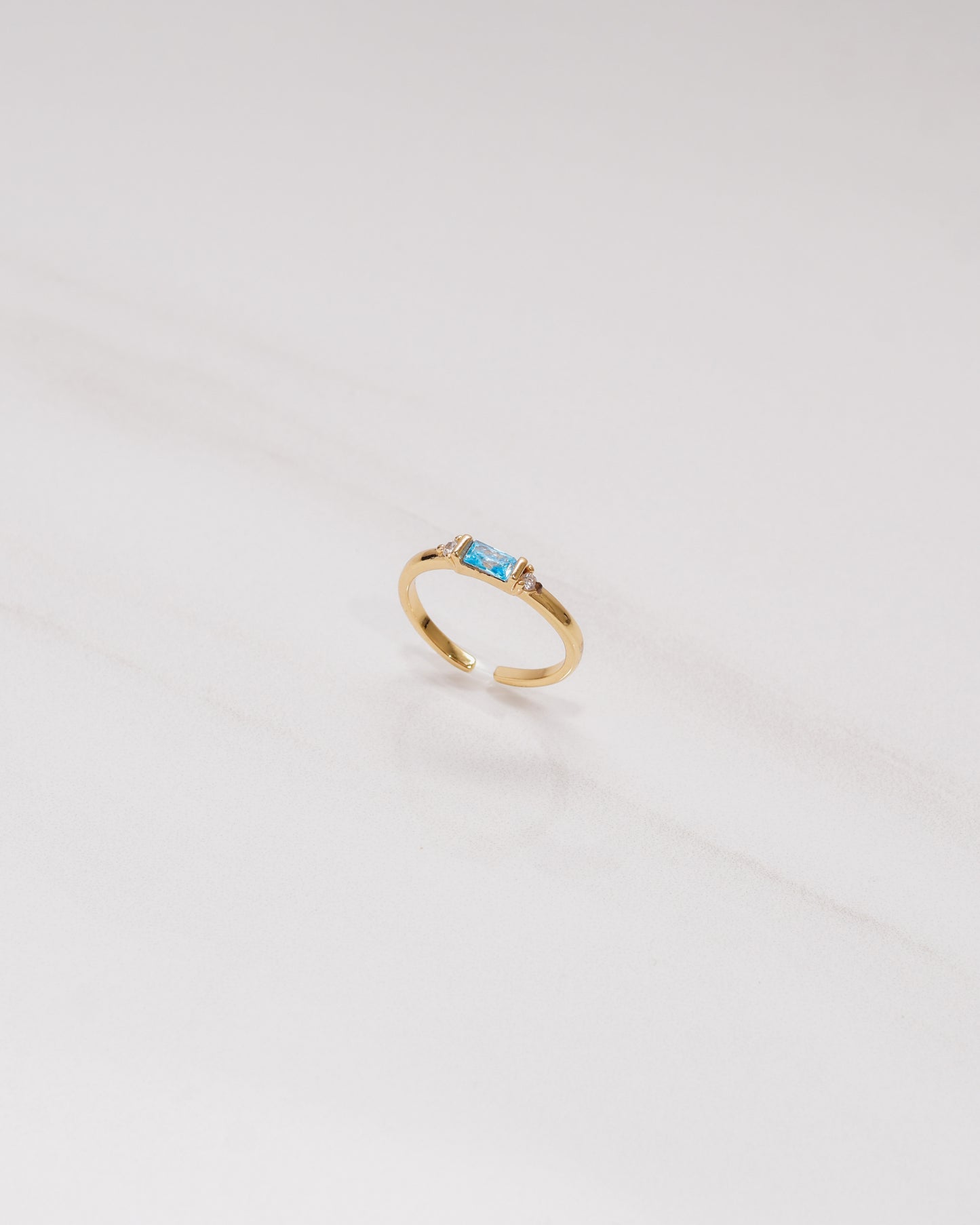 Dainty Blue Topaz Baguette Ring
